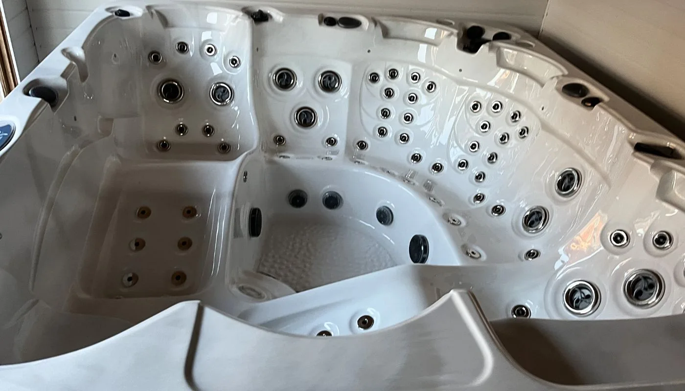 Empty, freshly cleaned hot tub after RL Spa service β ready to refill safely
